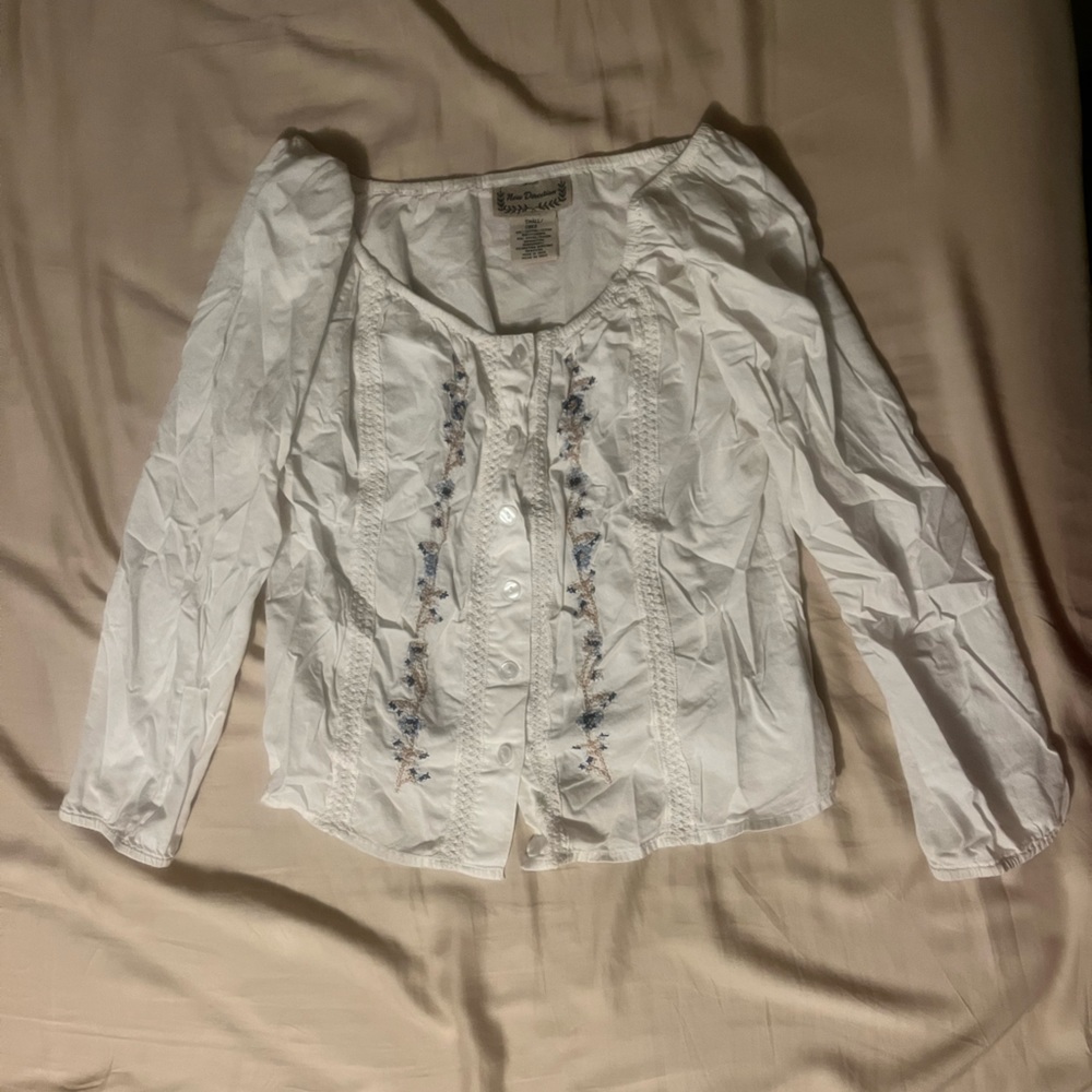 Ruffled blouse.